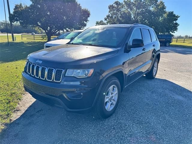 2017 Jeep Grand Cherokee Laredo in Diamond Black Crystal Pearlcoat — front three-quarter view