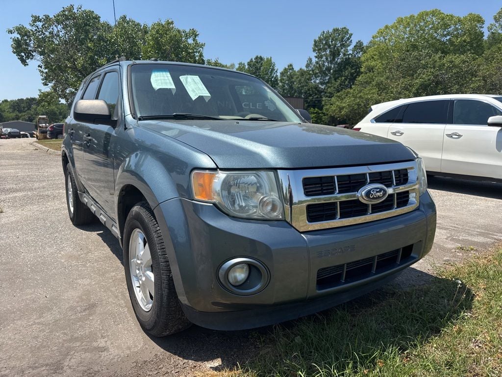 2011 Ford Escape XLT in Steel Blue Metallic — front three-quarter view