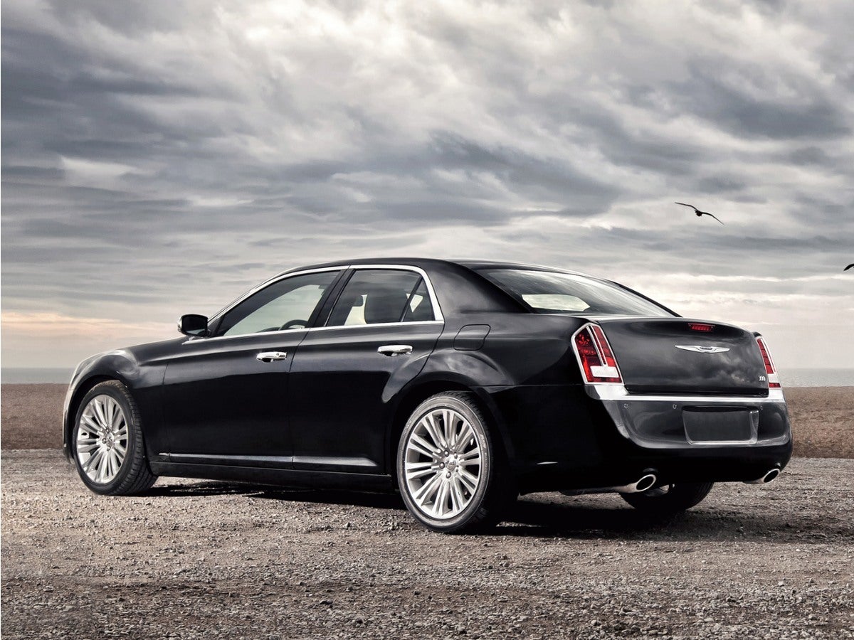 2011 Chrysler 300C Base in Deep Cherry Red Crystal Pearlcoat — front three-quarter view