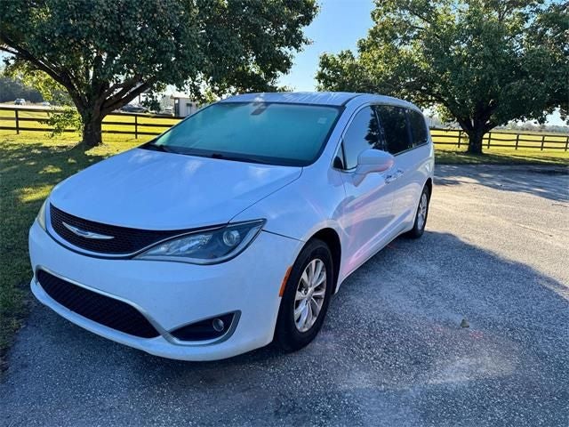 2019 Chrysler Pacifica Touring Plus in Bright White Clearcoat — front three-quarter view